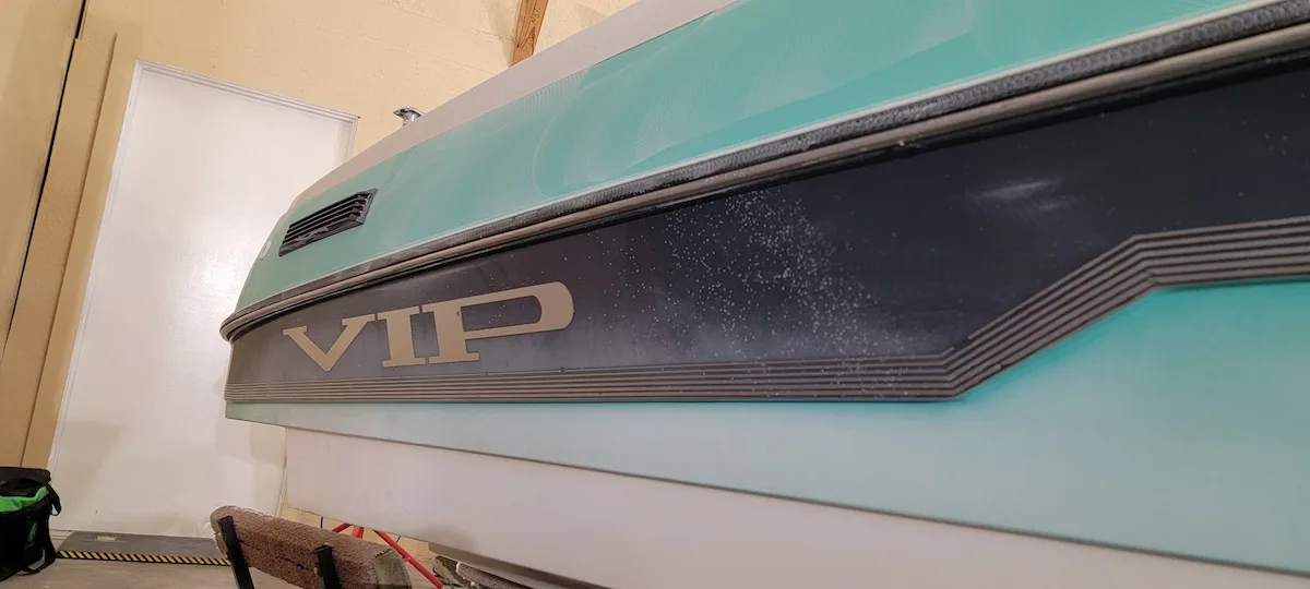 Faded boat hull before detailing and correction in North Alabama